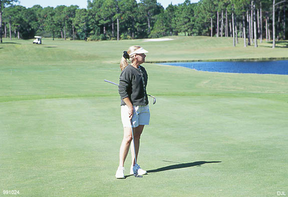 Denise waiting to drain it. 24 October 1999 - Destin, FL, by David J. L'Hoste